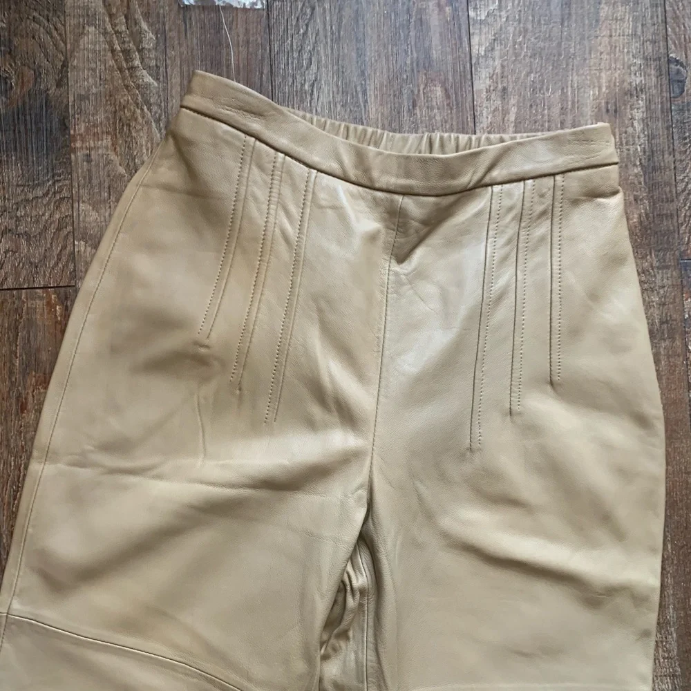 Terry Lewis Classic Luxuries zipper logo inseam